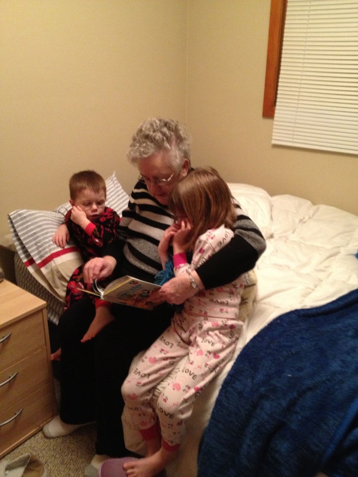 Mama reading Snow White and the Seven Dwarves to Abby & Aiden