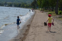 Aiden and Abby running along the shore of Lake Temiskaming.