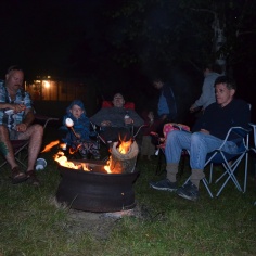 Sitting around the campfire roasting marshmallows on Fri evening