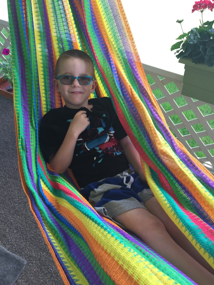 Aiden relaxing on the hammock at Aaron & Chantale's