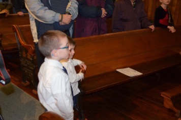 Aiden and Macklan supervising the Baptism