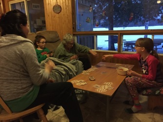 Auntie Joyce playing Crazy 8s with Abby, Aiden and Melissa