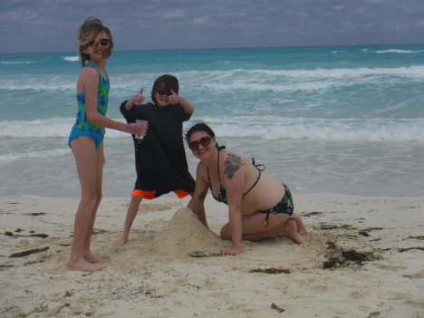 Melissa, Abby & Aiden building their sandcastle