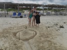 Melissa, Abby & Aiden with finished sandcastle & Moat.