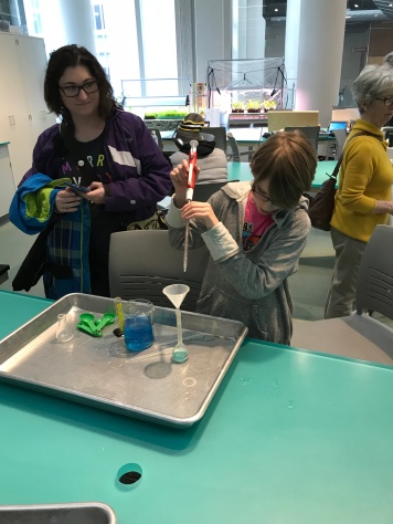 Abby conducting experiments at the Museum of Natural Sciences